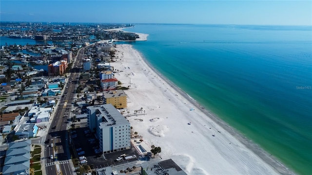 bird's eye view with a water view and a view of the beach