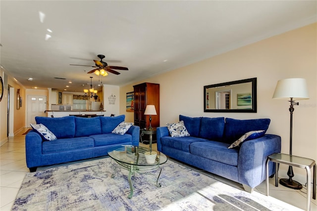 tiled living room with ceiling fan