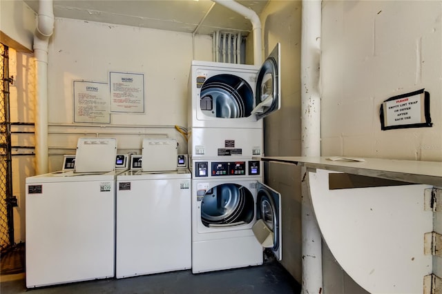 clothes washing area featuring stacked washer and clothes dryer and separate washer and dryer