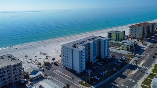 aerial view featuring a water view and a view of the beach