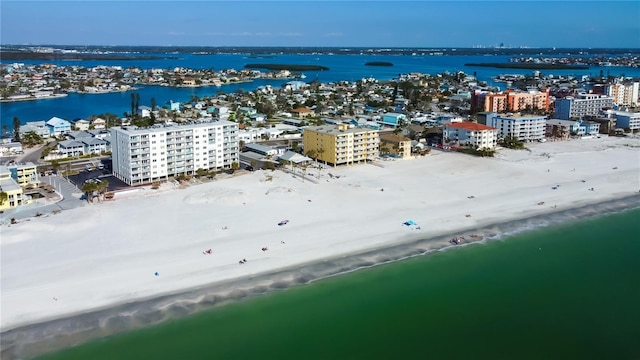 aerial view with a water view and a beach view