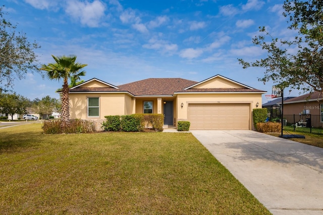 ranch-style home with a garage and a front lawn