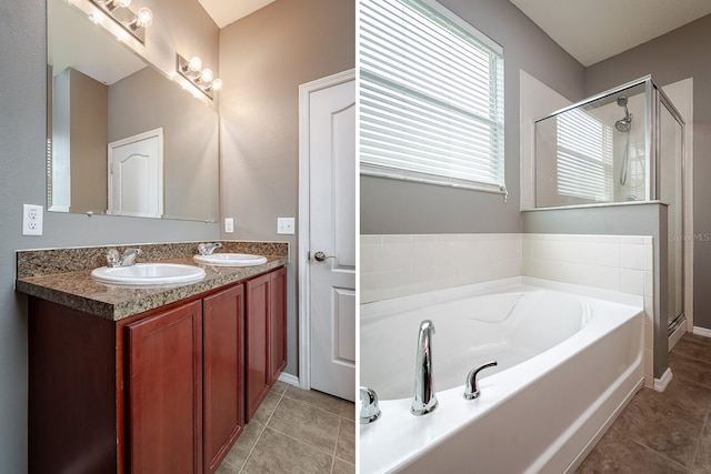 bathroom with tile patterned flooring, vanity, and separate shower and tub