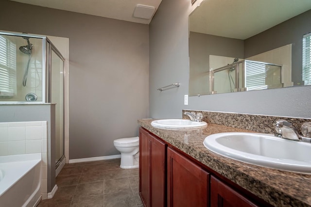 full bathroom with vanity, toilet, separate shower and tub, and tile patterned flooring