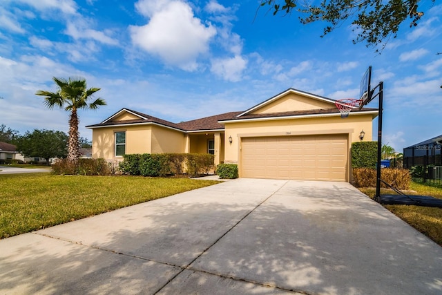 ranch-style house with a garage and a front lawn