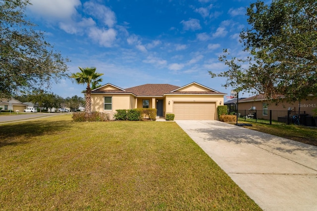 ranch-style house featuring a garage and a front lawn