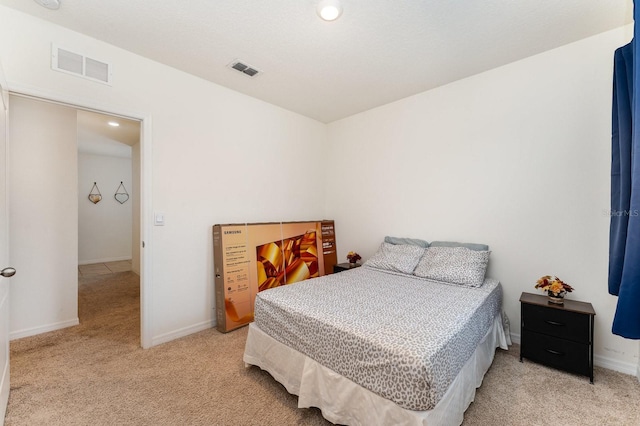 bedroom featuring carpet