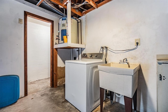 clothes washing area with sink and washer / dryer