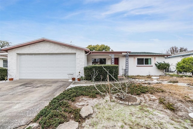 ranch-style house featuring a garage