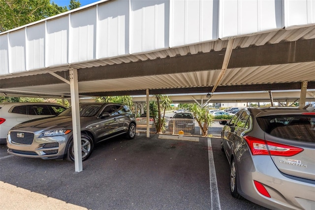 view of vehicle parking featuring a carport