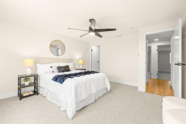 carpeted bedroom featuring ceiling fan