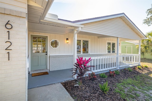 entrance to property with covered porch