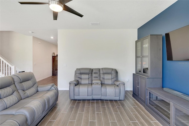 living room with ceiling fan