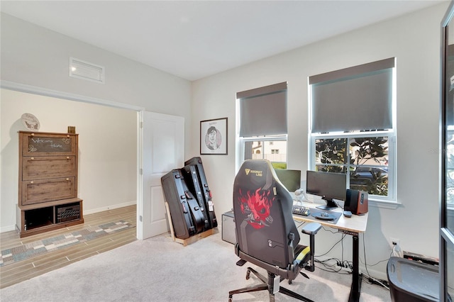 office area with wood-type flooring