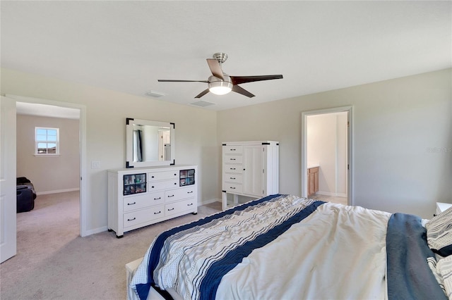 bedroom featuring light colored carpet and ceiling fan