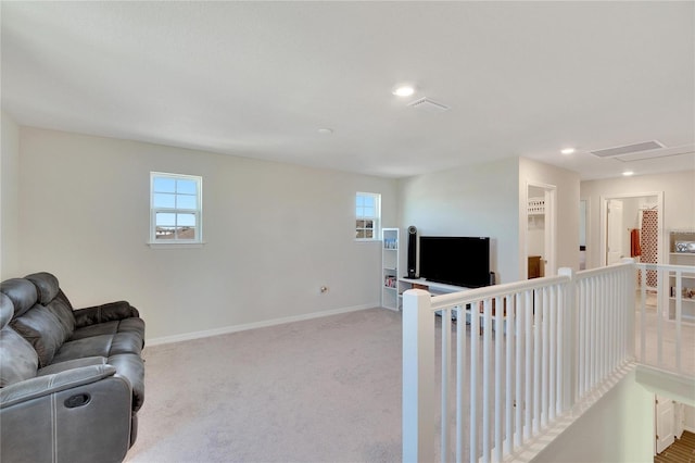 living room featuring light colored carpet