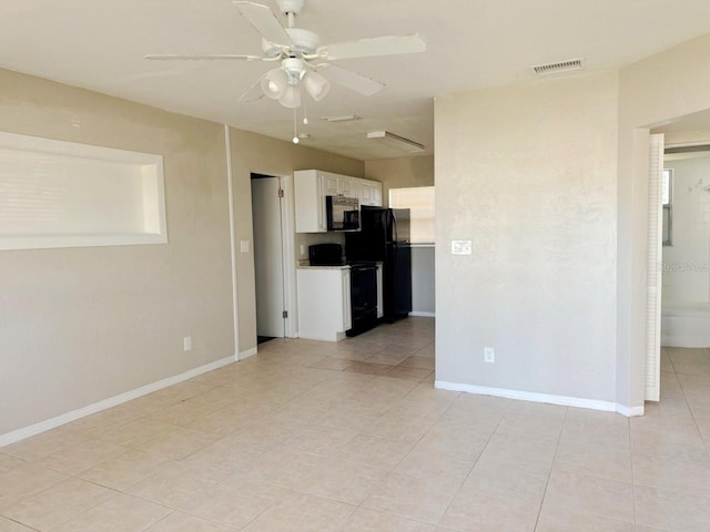 interior space featuring white cabinetry, light tile patterned floors, black appliances, and ceiling fan