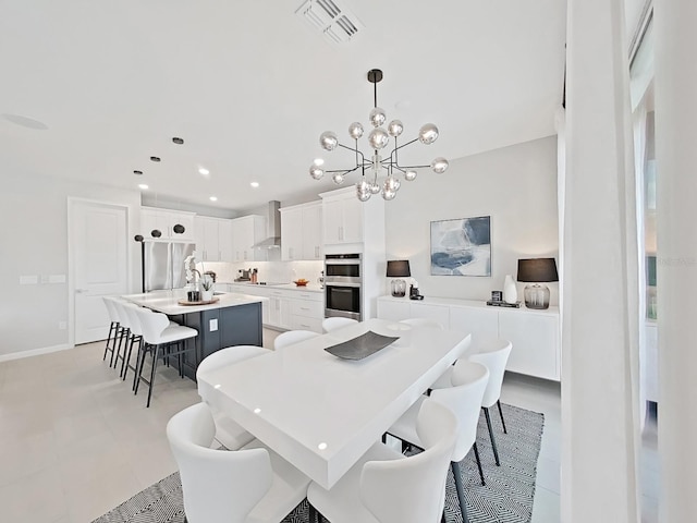 dining room featuring a chandelier