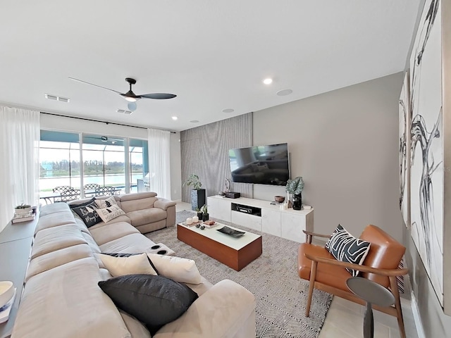 living room with ceiling fan