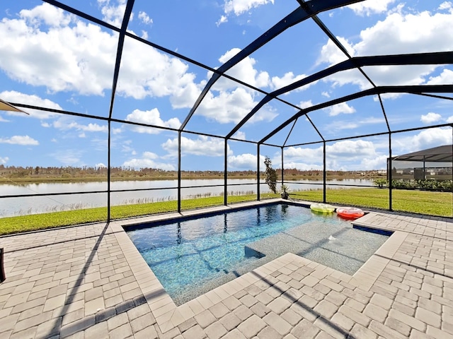 view of pool with a water view, a patio area, and glass enclosure