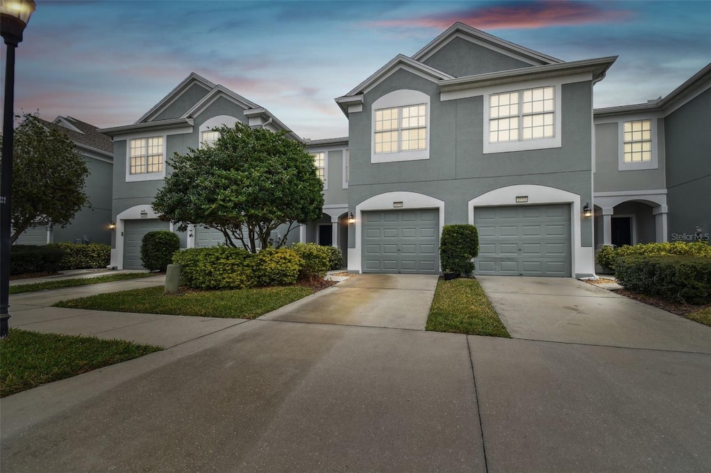 view of front of home with a garage