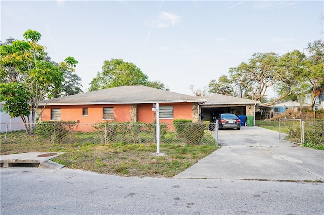 single story home featuring a garage