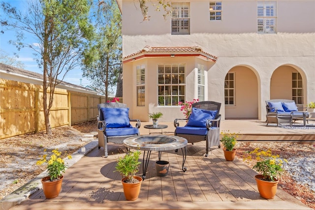 view of patio / terrace with outdoor lounge area and a wooden deck