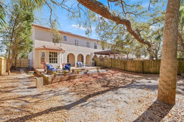 back of house featuring a patio area