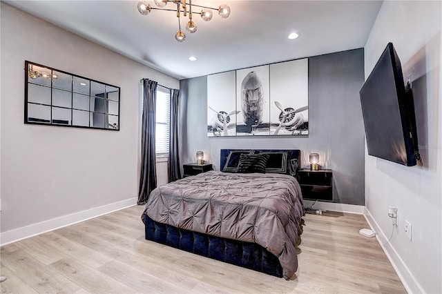 bedroom with light hardwood / wood-style floors