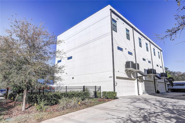 view of building exterior featuring a garage