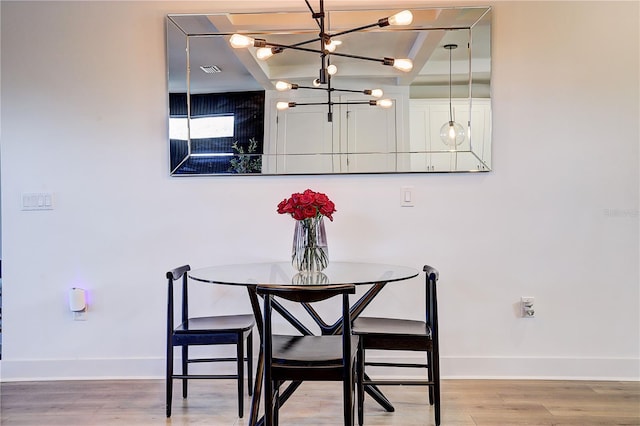 dining area featuring hardwood / wood-style flooring