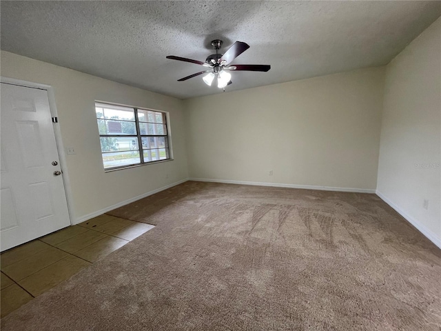 interior space featuring ceiling fan and a textured ceiling