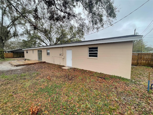 rear view of property with a deck