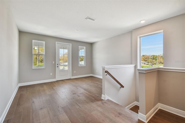 interior space with hardwood / wood-style floors