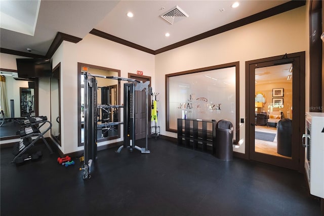 exercise room with crown molding