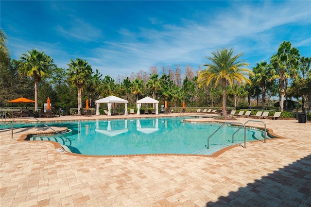 view of pool featuring a gazebo and a patio area