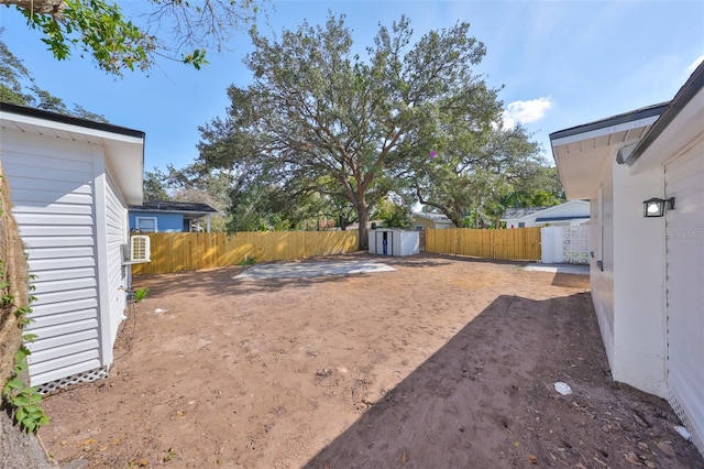 view of yard with a storage shed