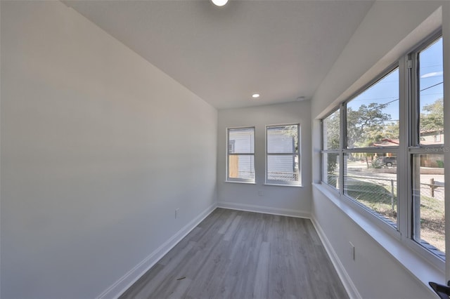 unfurnished sunroom featuring a healthy amount of sunlight