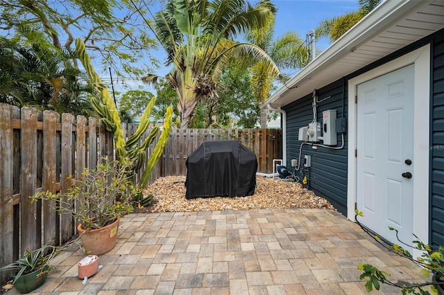 view of patio featuring a grill