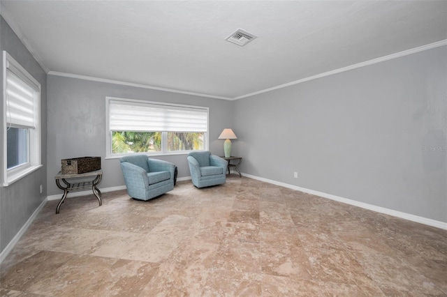 living area featuring crown molding