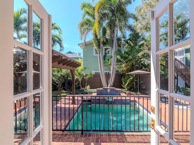 view of swimming pool with a patio area