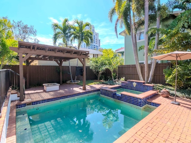 view of pool with a pergola, a patio area, and an in ground hot tub