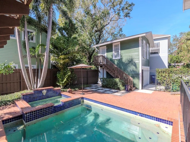 view of pool featuring a patio area