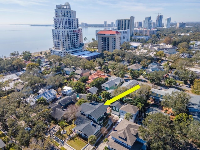 birds eye view of property featuring a water view