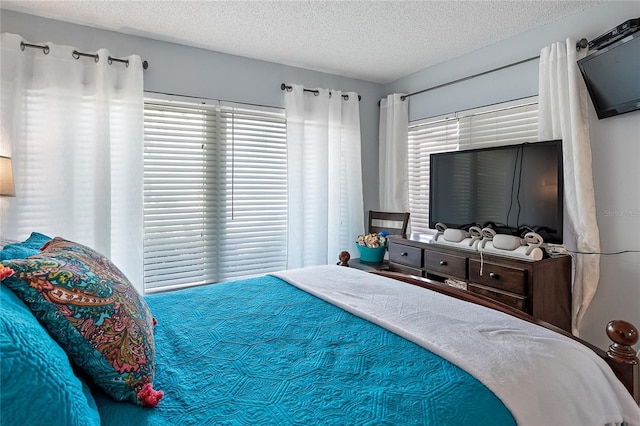 bedroom with a textured ceiling