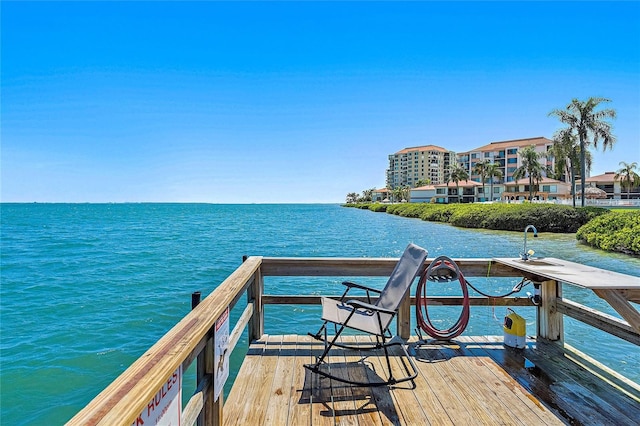 dock area featuring a water view