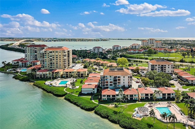 birds eye view of property featuring a water view