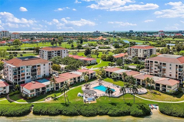 birds eye view of property featuring a water view