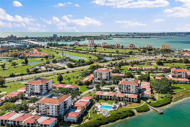 birds eye view of property with a water view