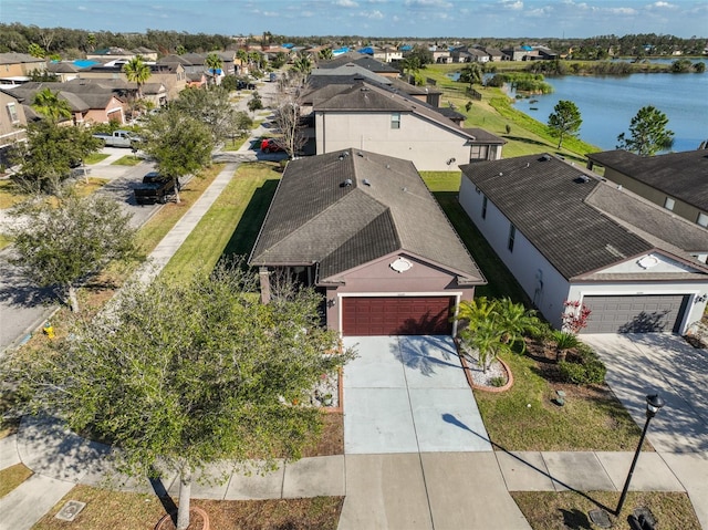 drone / aerial view featuring a water view